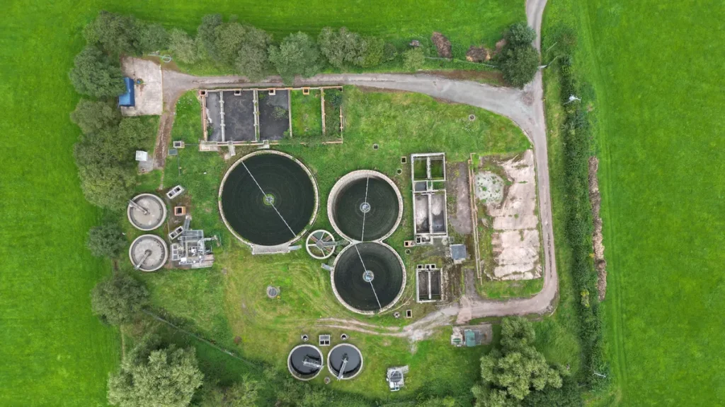 Aerial view of wastewater treatment tanks and facilities